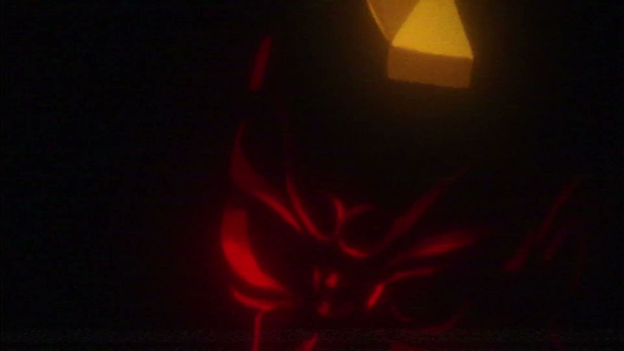 Official Village in the Shade footage: a red mask figure in the dark